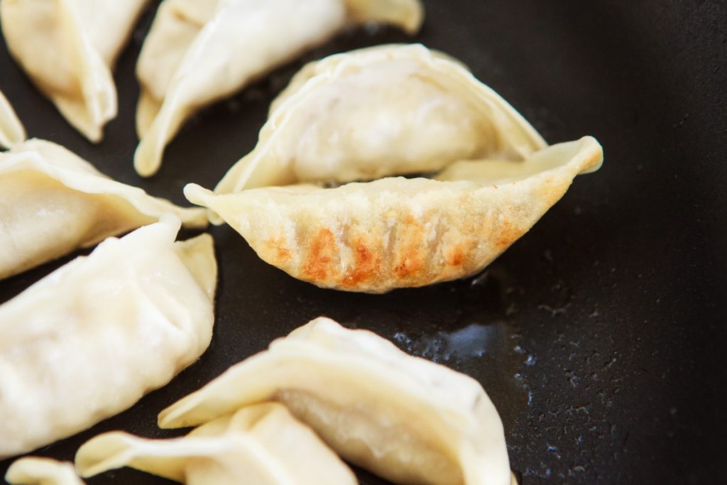 How to cook Frozen Gyoza with Crispy Lacy “Wings” FOOD is Four Letter